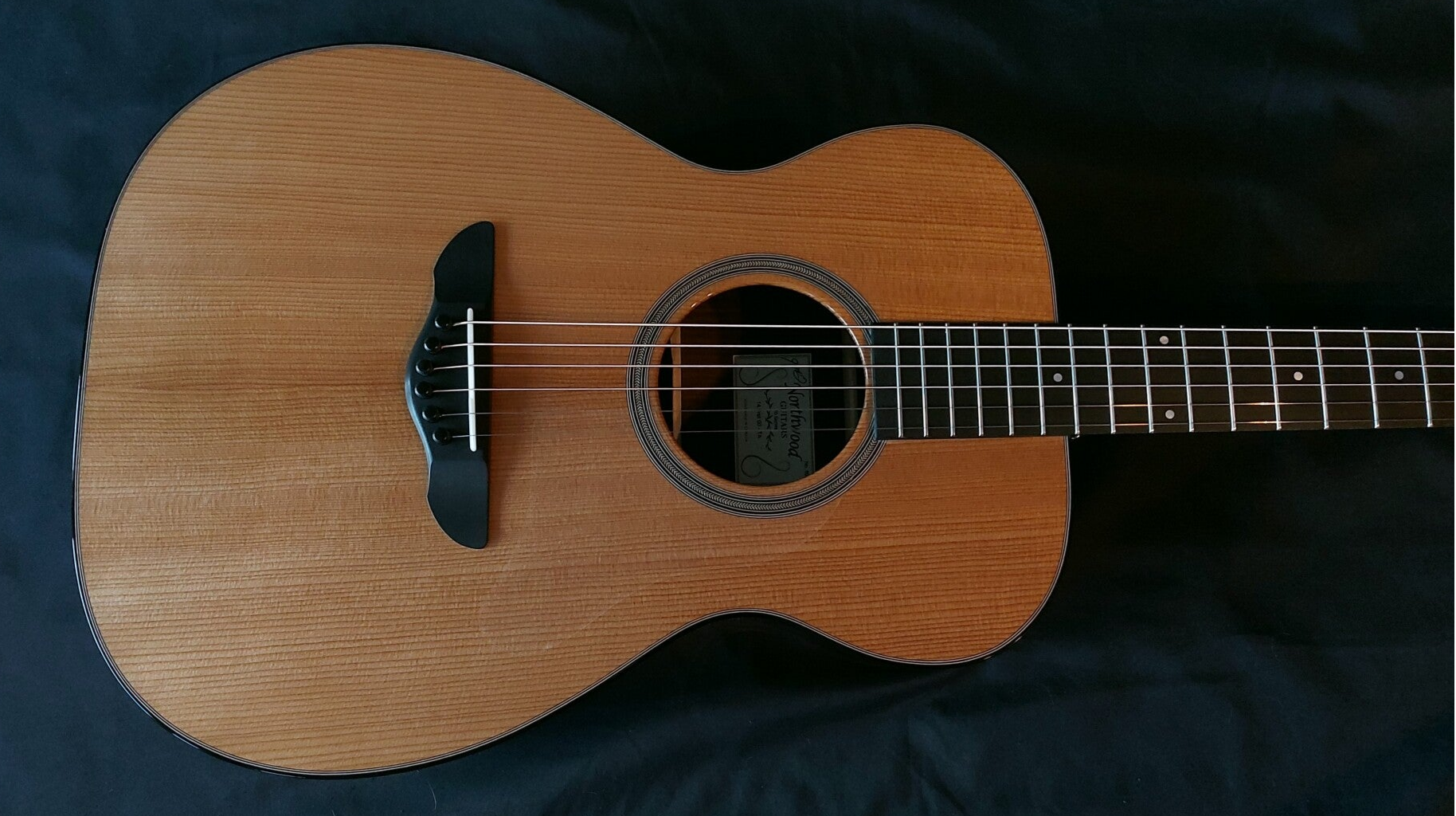 Northwood guitars 14 fret 00 acoustic guitar model with Torrefied Adirondack spruce soundboard and 14 fret neck length.