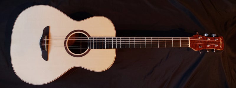 Northwood guitars 12 fret L-00 acoustic guitar model with Claro Walnut back and sides, flamed maple binding and Engelmann spruce top
