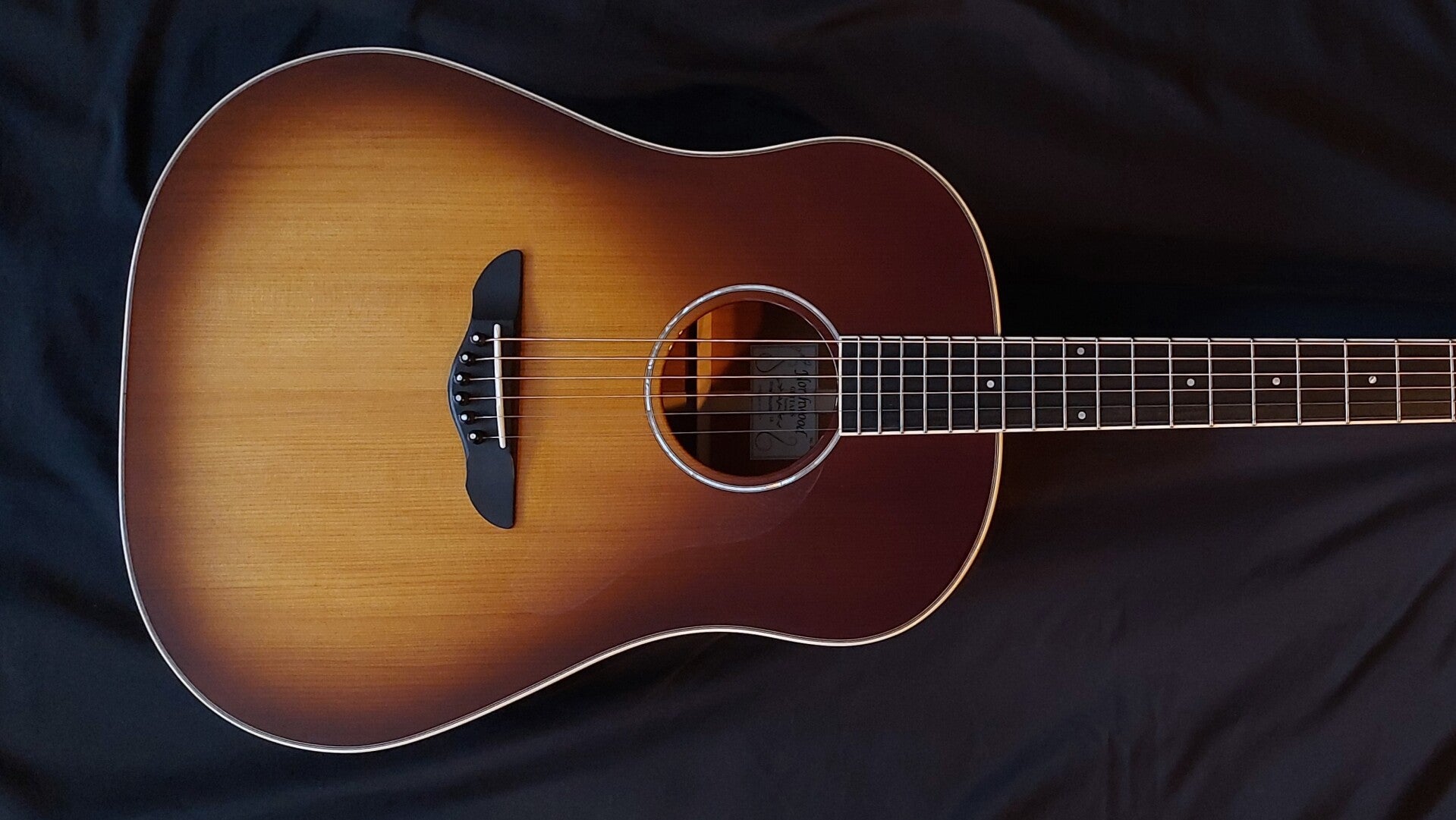 Northwood guitars Slope shoulder Dreadnought model acoustic guitar with sunbursat finish, mahogany back and sides and torrefied adirondack spruce top.