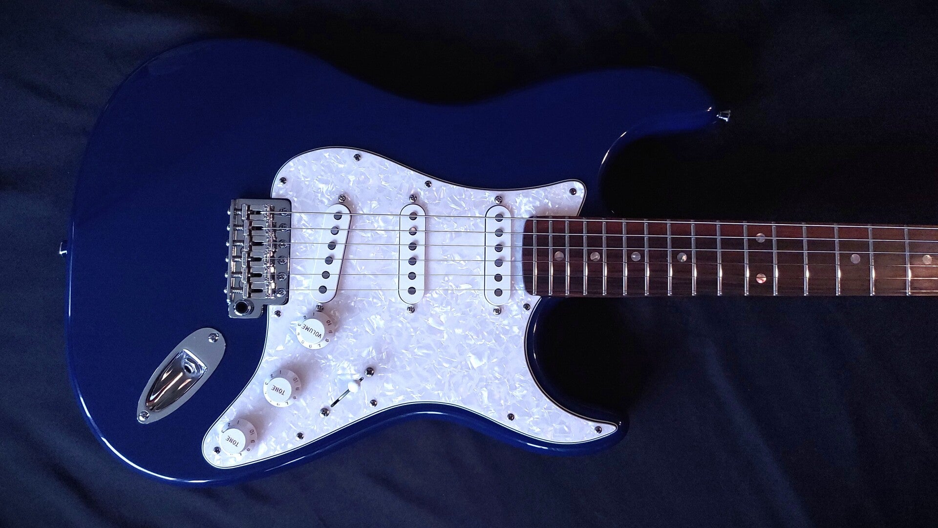 Northwood S style electric guitar with pearloid pickguard in Lake Placid Blue