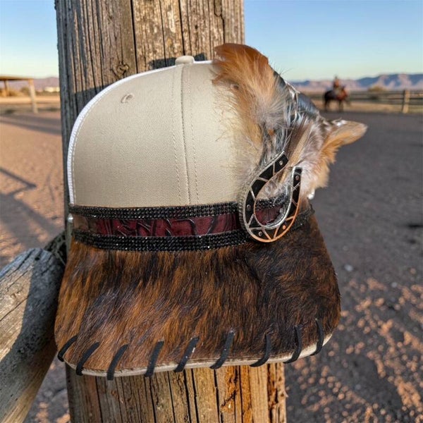 Tan and White Cap with Maroon and Black Leather Band, Feathers, and Black Accent