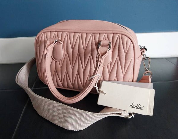 Lichtroze tas met band