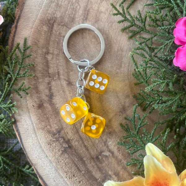 Sleutelhanger Dobbelsteen - Donker Geel Transparant