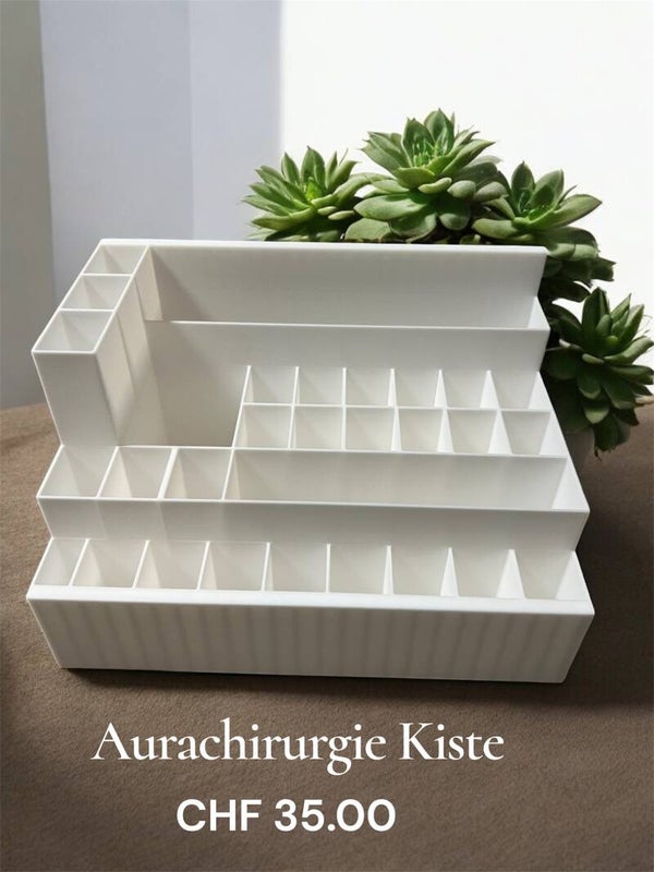 Aurachirurgie ( Kiste )