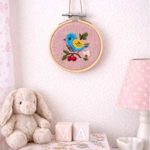 Mini borduurwerk vogeltje