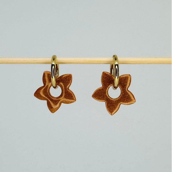 Étoile marron nacrée