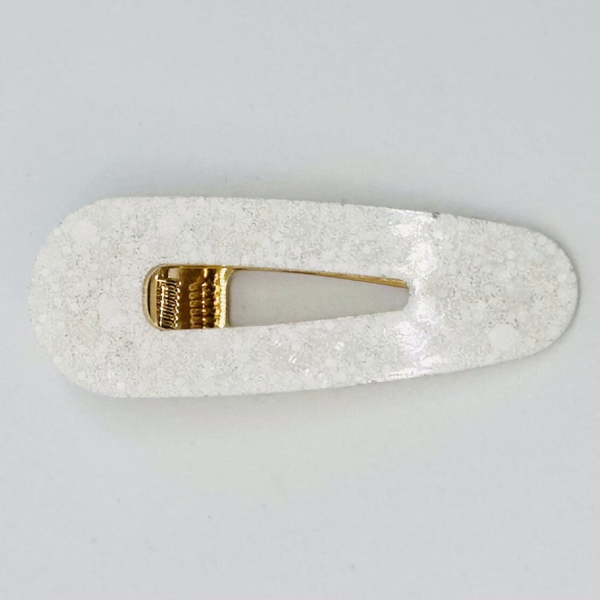Triangle blanc pailleté
