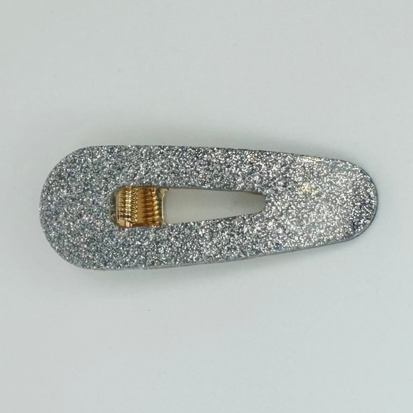 Triangle argent pailleté