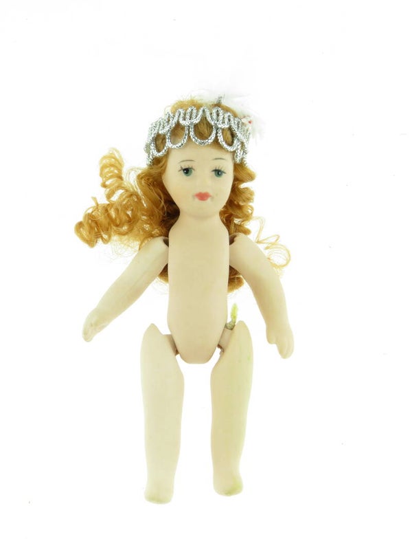 Porseleinen ledematen popje