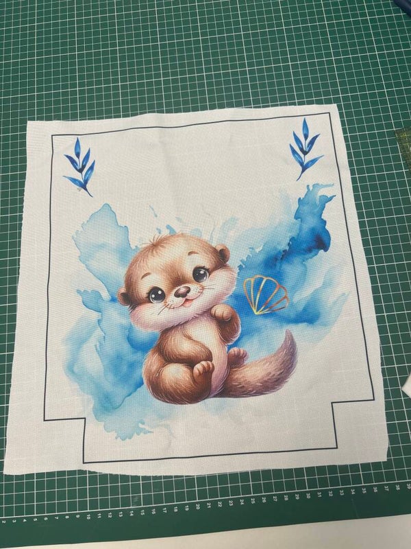 Devant sac maternelle Milo la Loutre