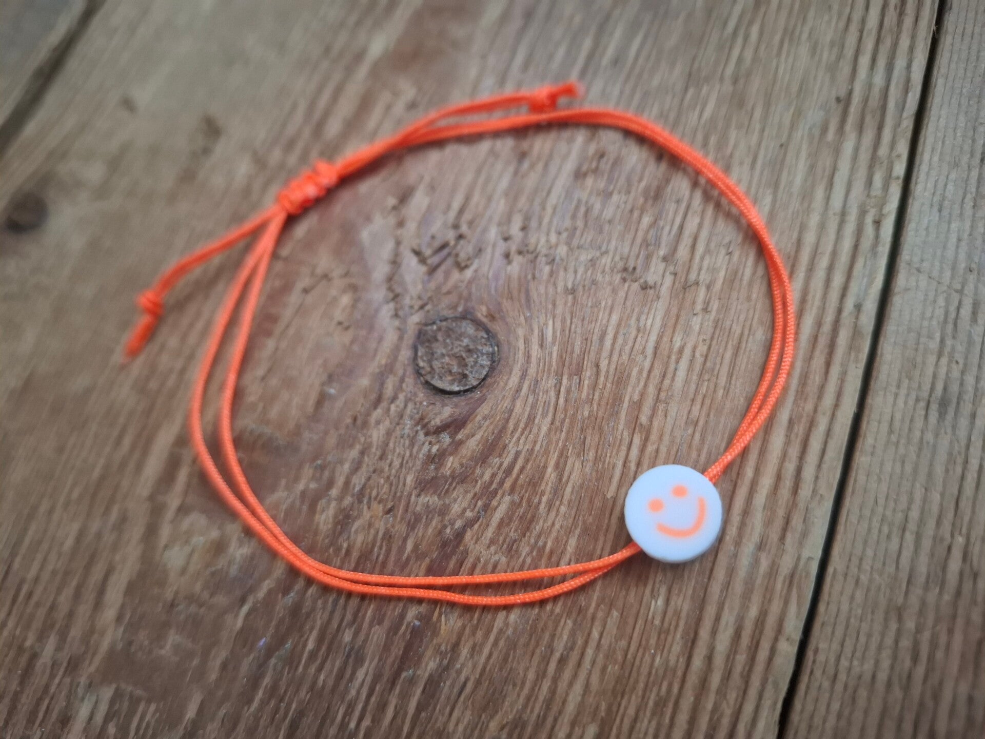 FILIGRANES Armband Smiley NEONORANGE
