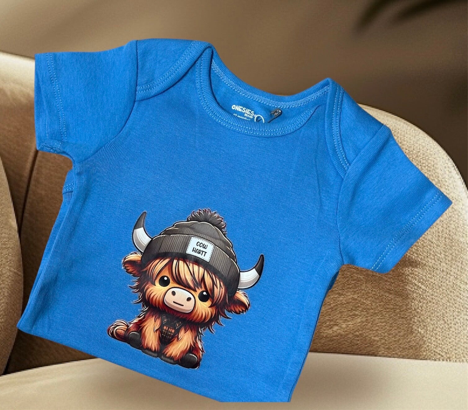 COW HARTT ONESIES