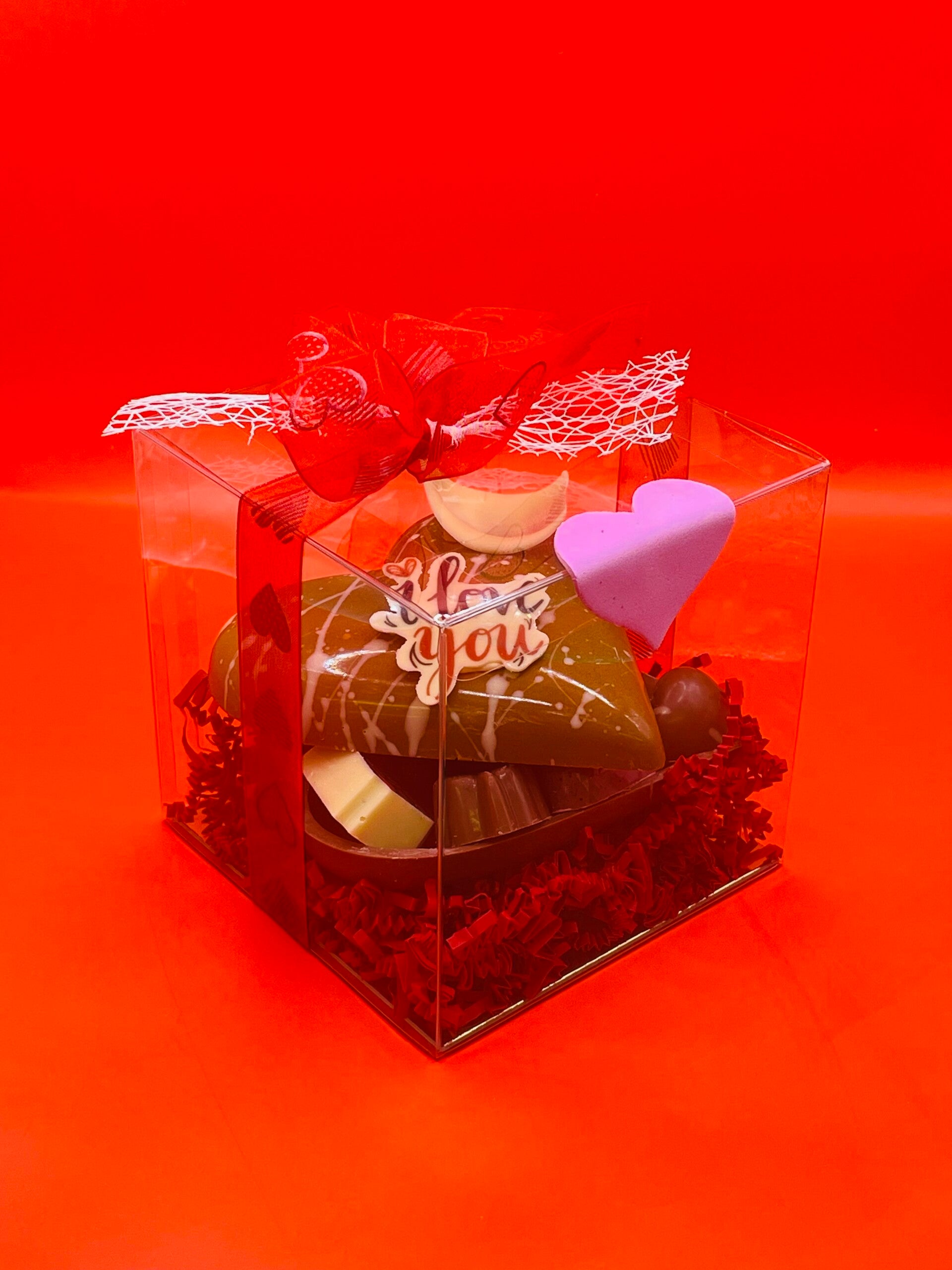 Transparant doosje met gevuld hart pralines