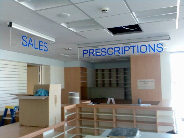 Wayfinding and directional signage systems for Brisbane hospitals, universities, and shopping centers.