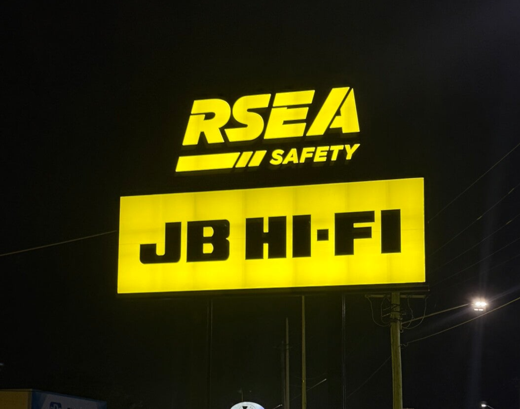Custom illuminated outdoor lightbox for Seasons IGA, featuring high-visibility LED backlit branding installed by Brisbane signwriters.