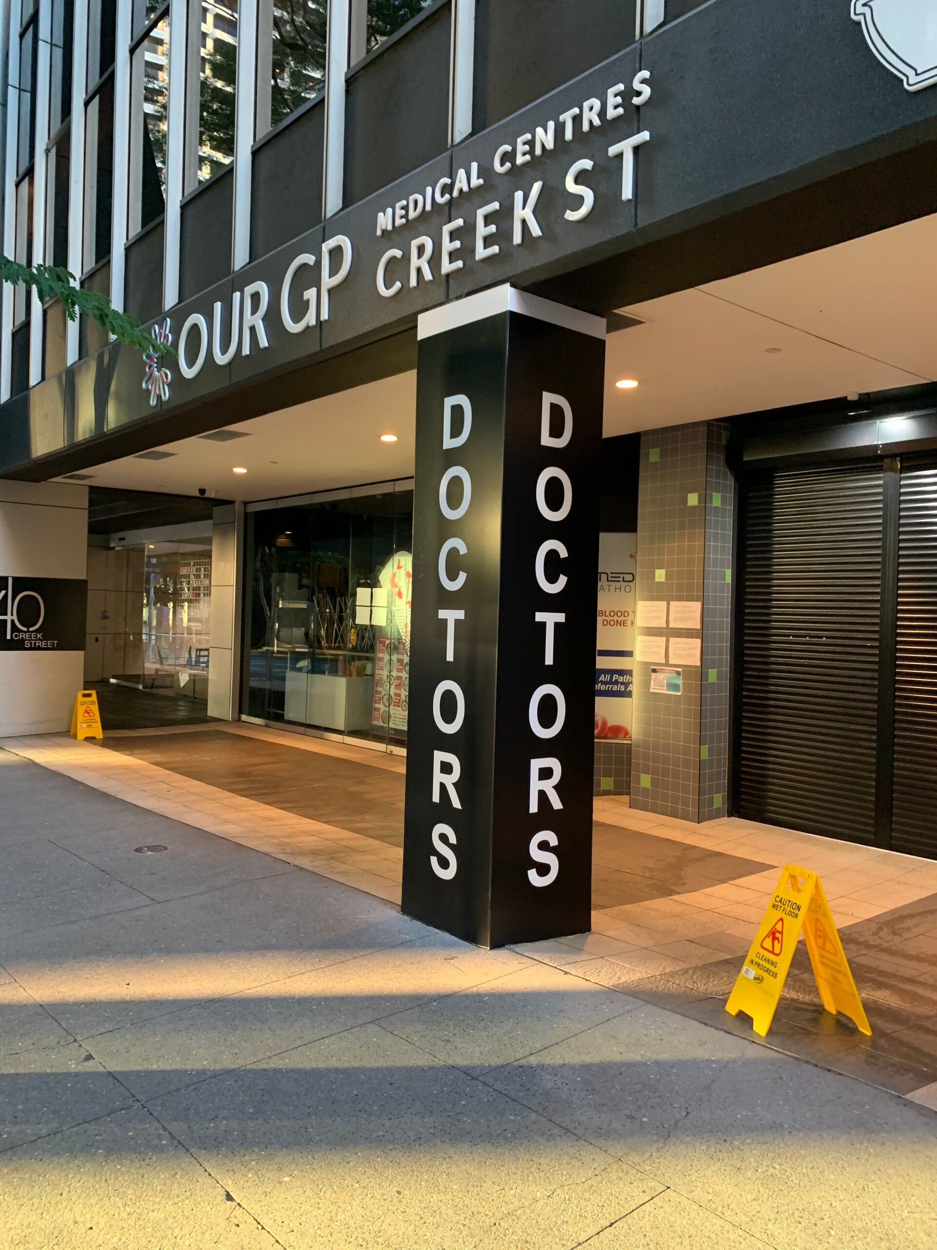 Commercial signage projects in Brisbane featuring park wayfinding signs, a large red IGA pylon sign, and external building branding for the Housing Industry Association.