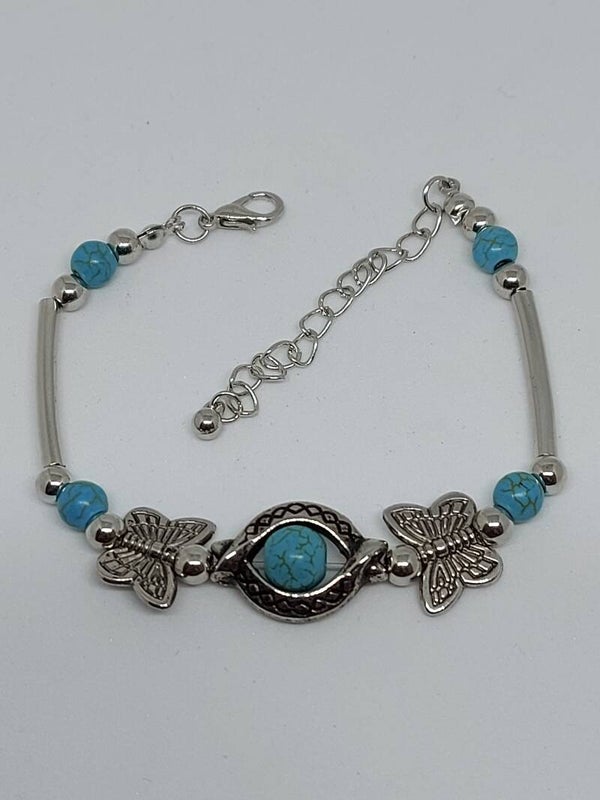 Armbandje met Turquoise gekleurde steen