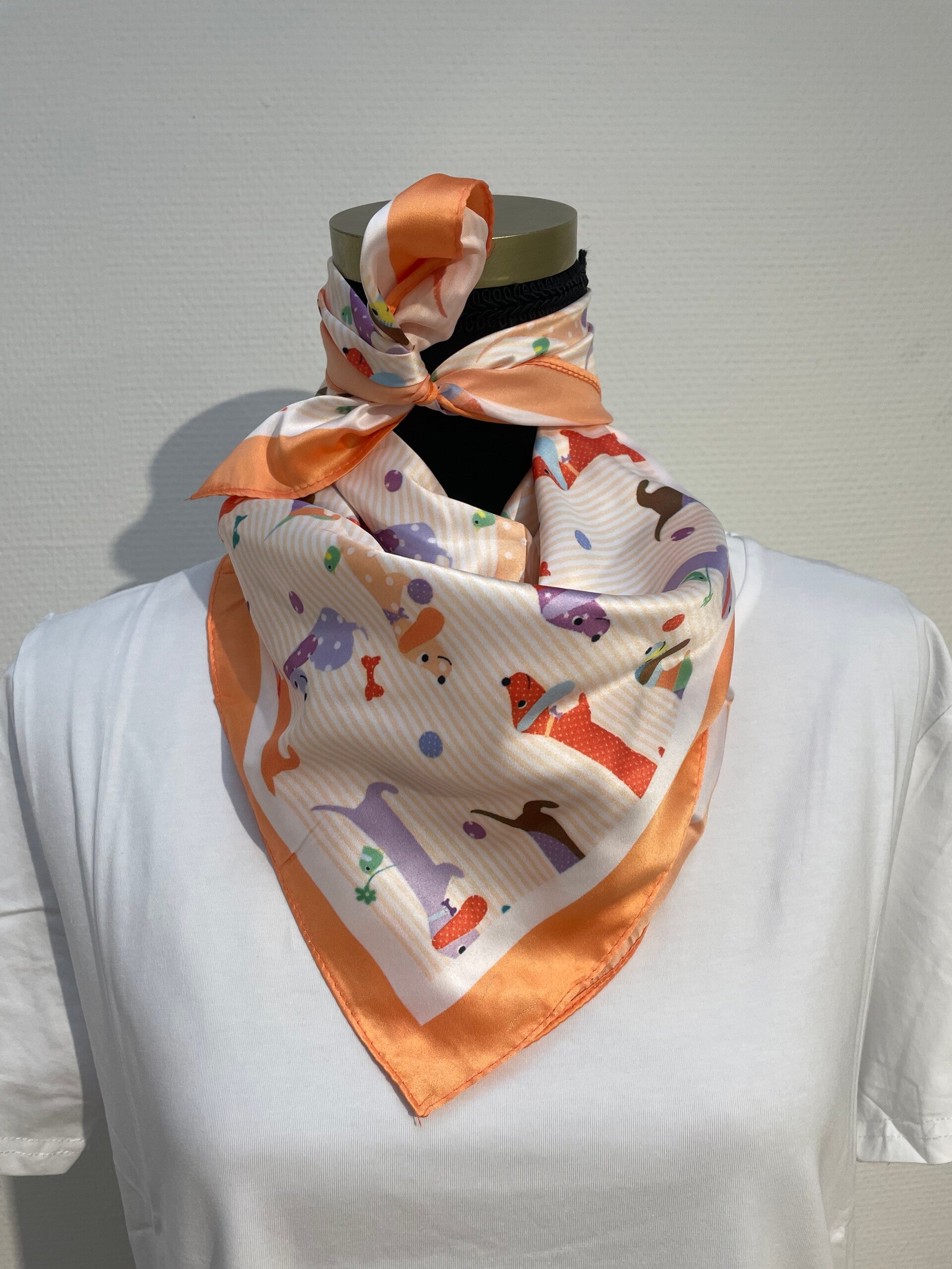 Kleine vierkant tekkel sjaal