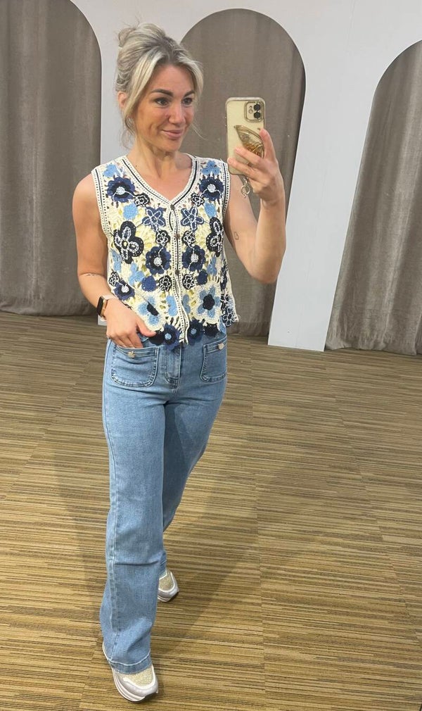 Giletje blauw bloemetjes