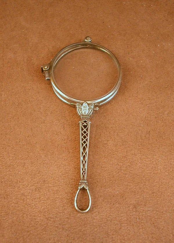 Paire de binocles dépliantes, face à main ancien en argent massif