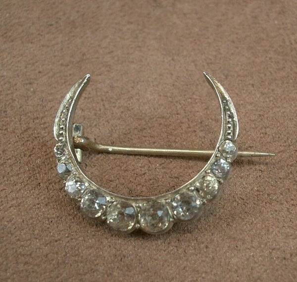 Broche ancienne en argent et pierre du Rhin croissant de lune