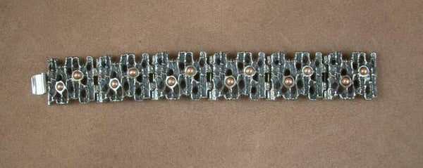 Bracelet Moderniste en métal argenté signé Robert Larin