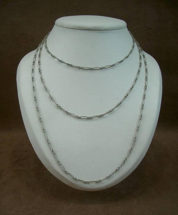 Collier sautoir ancien en argent massif