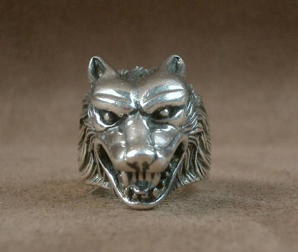 Importante bague tête de loup en argent massif 23,5g