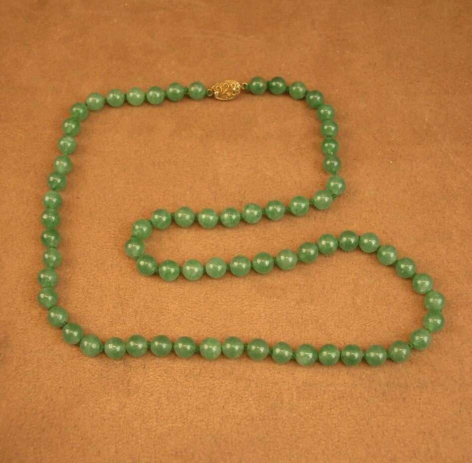 Collier en perles de jade fermoir en vermeil