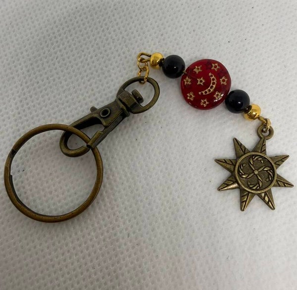 Keychain - Antique, Onyz, Red Czech bead with stars, Antique Star Charm
