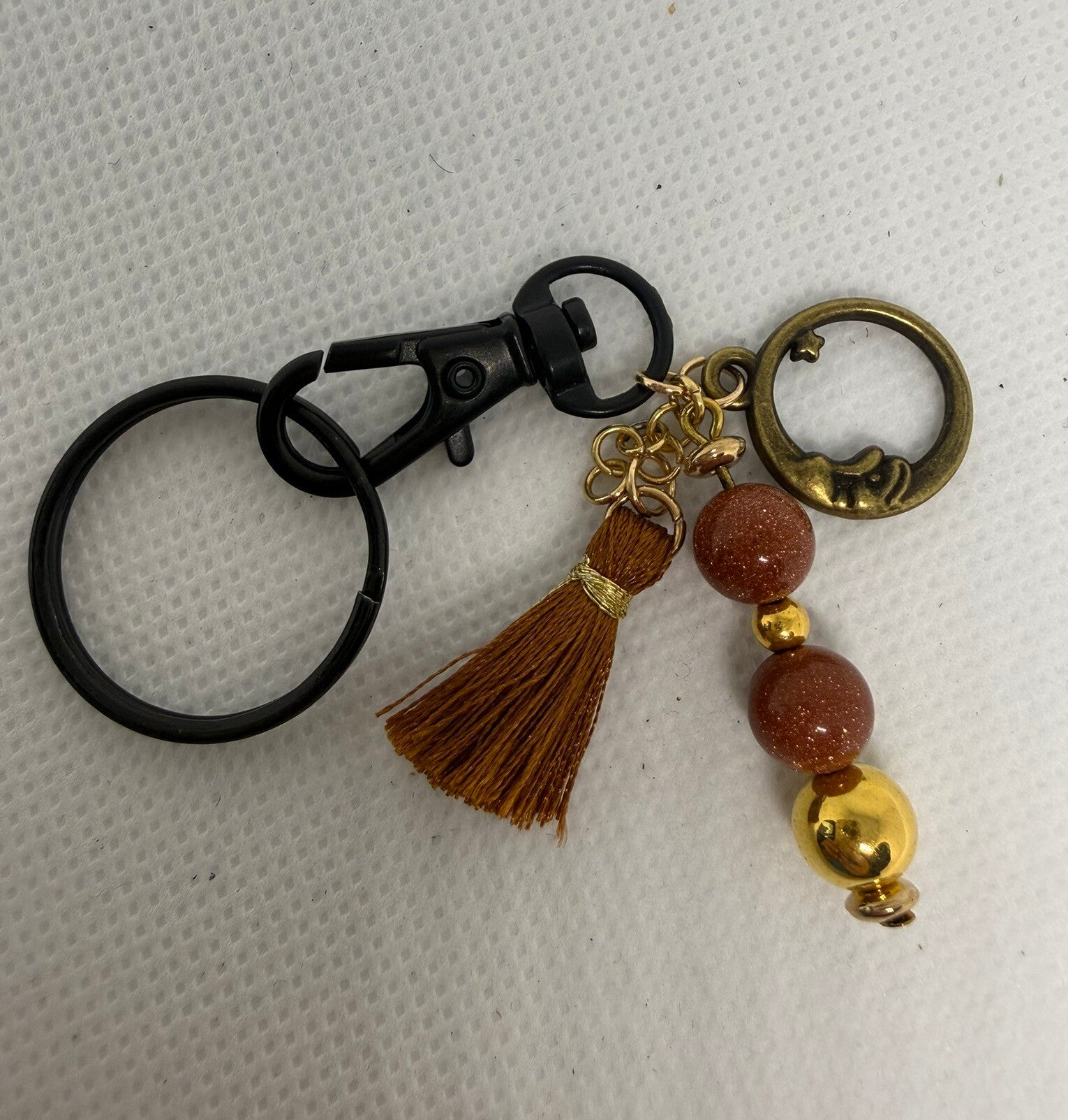 Keychain - Black, Goldstone Beads, Copper Tassel