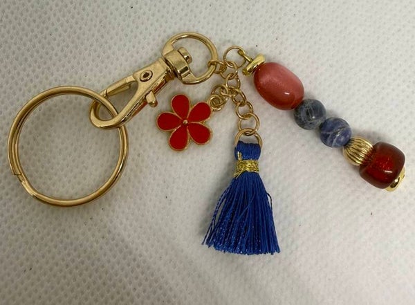 Keychain - Gold, Sodalite, Red Czech Glass Beads, Red Enamel Flower Charm, Blue Tassel
