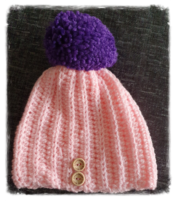 Bobble hat with pom pom bobble
