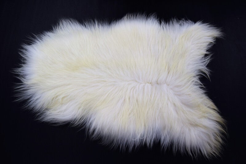 Ijslands schapenvacht wit/licht gelig.