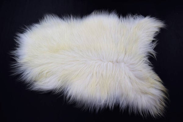 Ijslands schapenvacht wit/licht gelig.