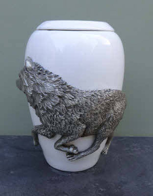 as urn (middel) grote hond. AFBEELDING VOS