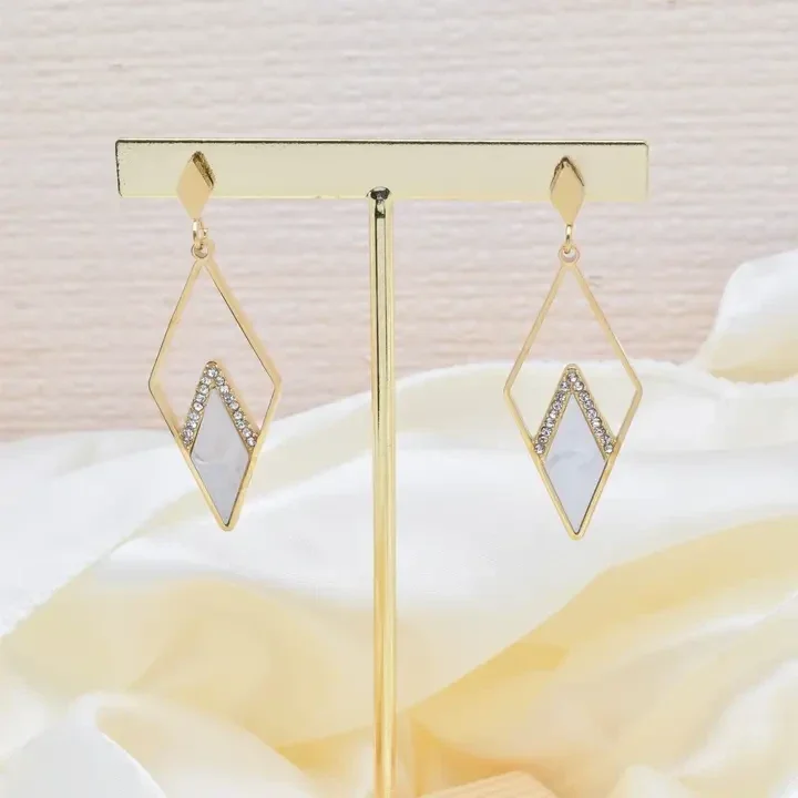 oorbellen met parelmoer en strass