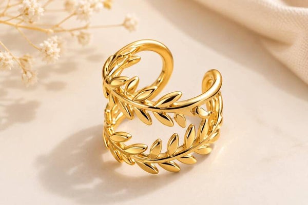 Bague dorée ajustable double branche de feuilles