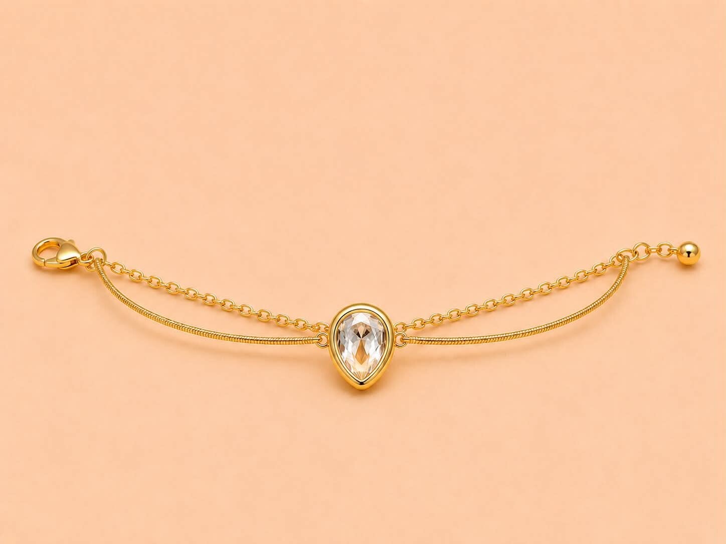 Bracelet double chaîne avec strass goutte Doré