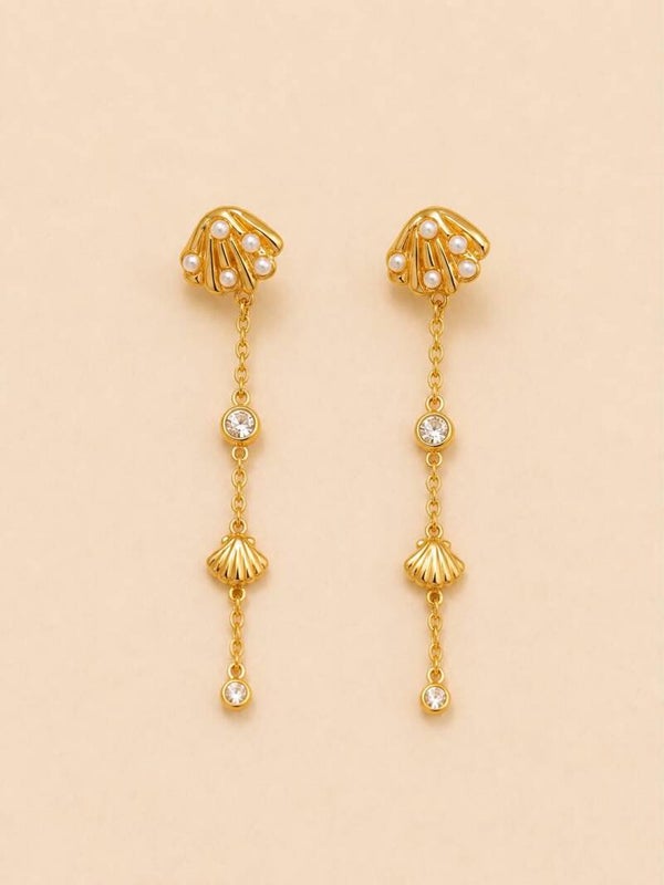 Boucles d'oreilles pendantes coquillages et strass Doré.
