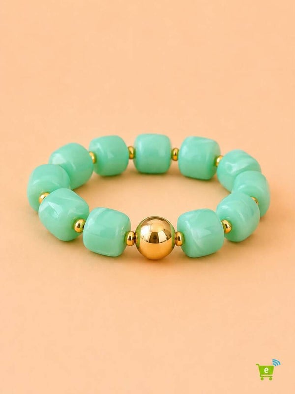 Bracelet élastique perles carrées et bille dorée Vert