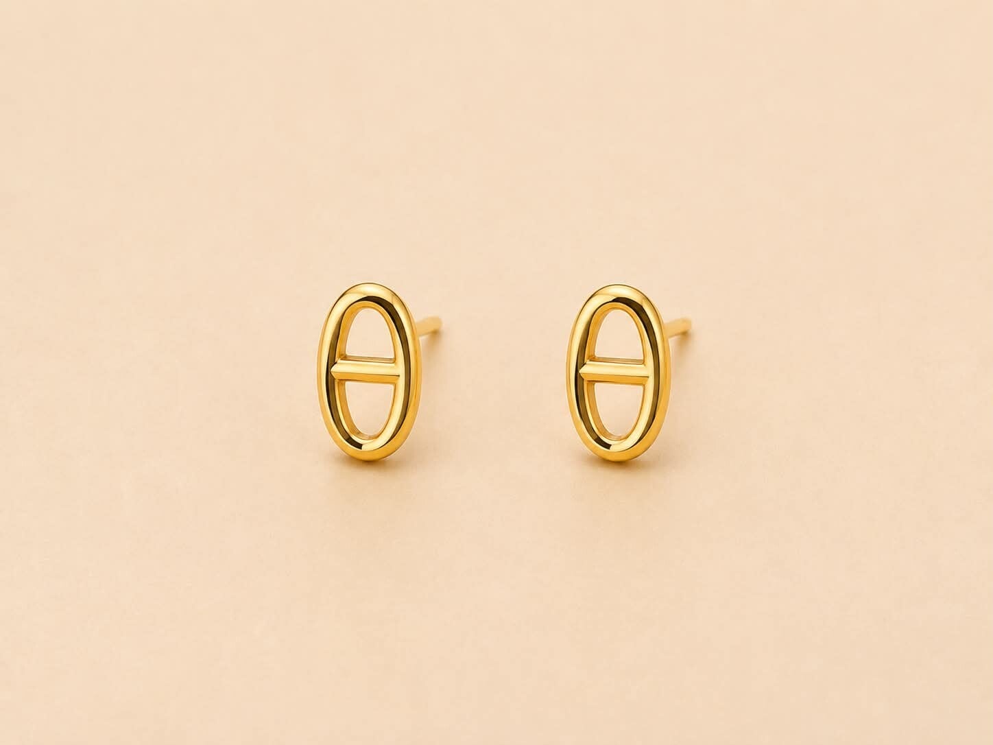 Boucles d'oreilles puces motif ovale style moderne Doré