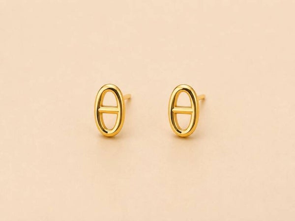 Boucles d'oreilles puces motif ovale style moderne Doré