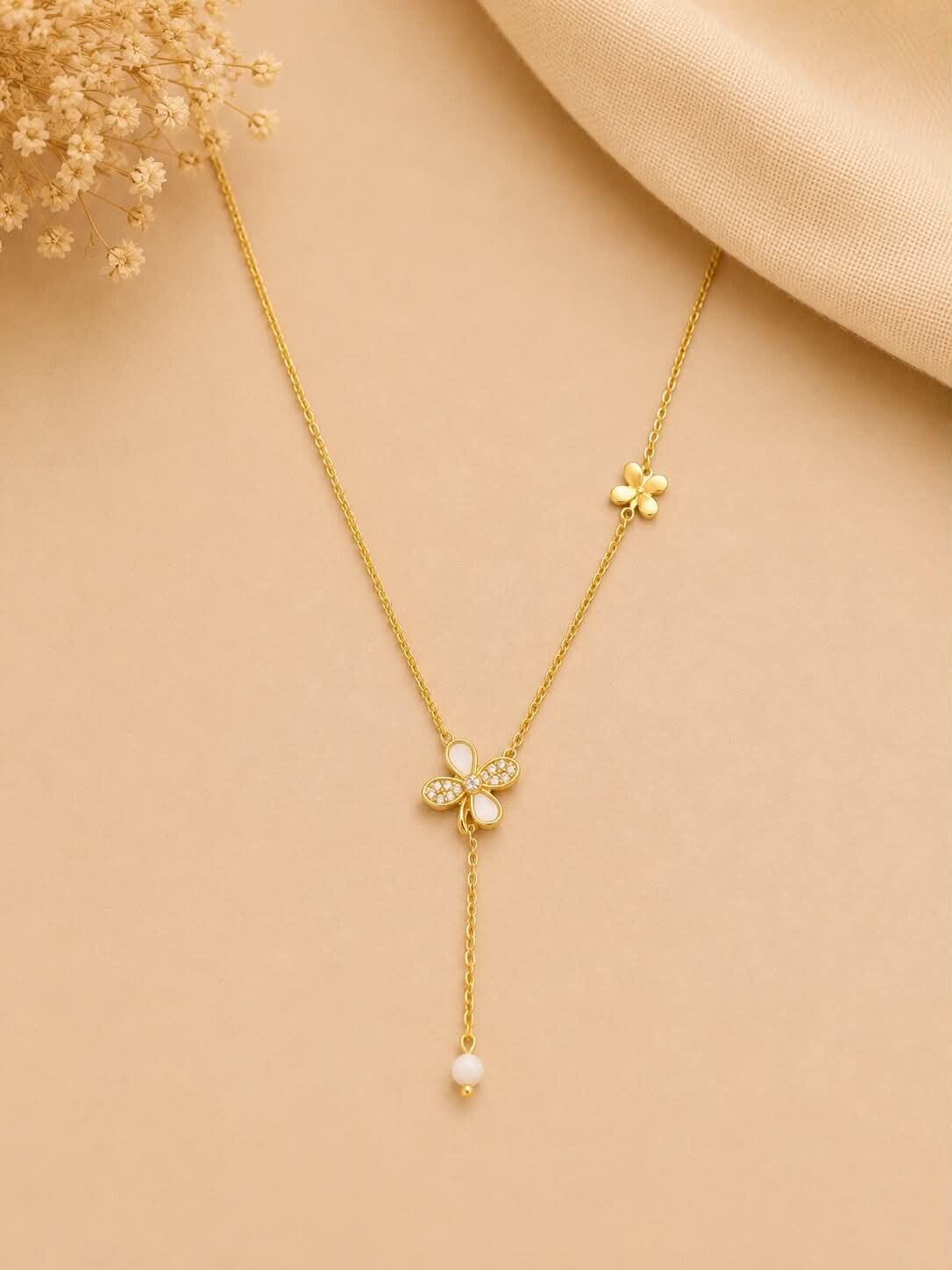Collier trèfle à quatre feuilles pendant bille Doré