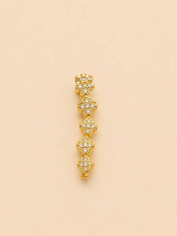 Boucle d'oreille unique en arc fleuri serti de strass Doré