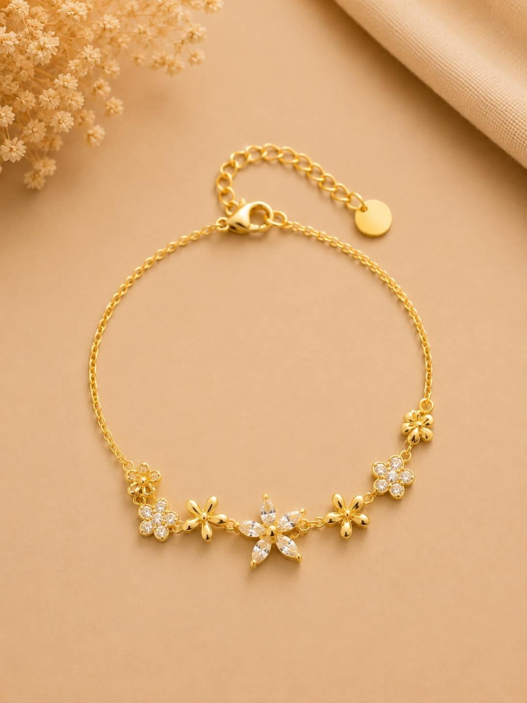 Bracelet à fleurs assorties et strass scintillants Doré