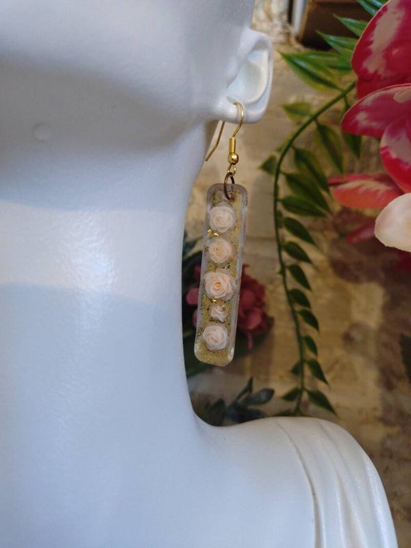 Boucles d'oreilles pendante rose pâle