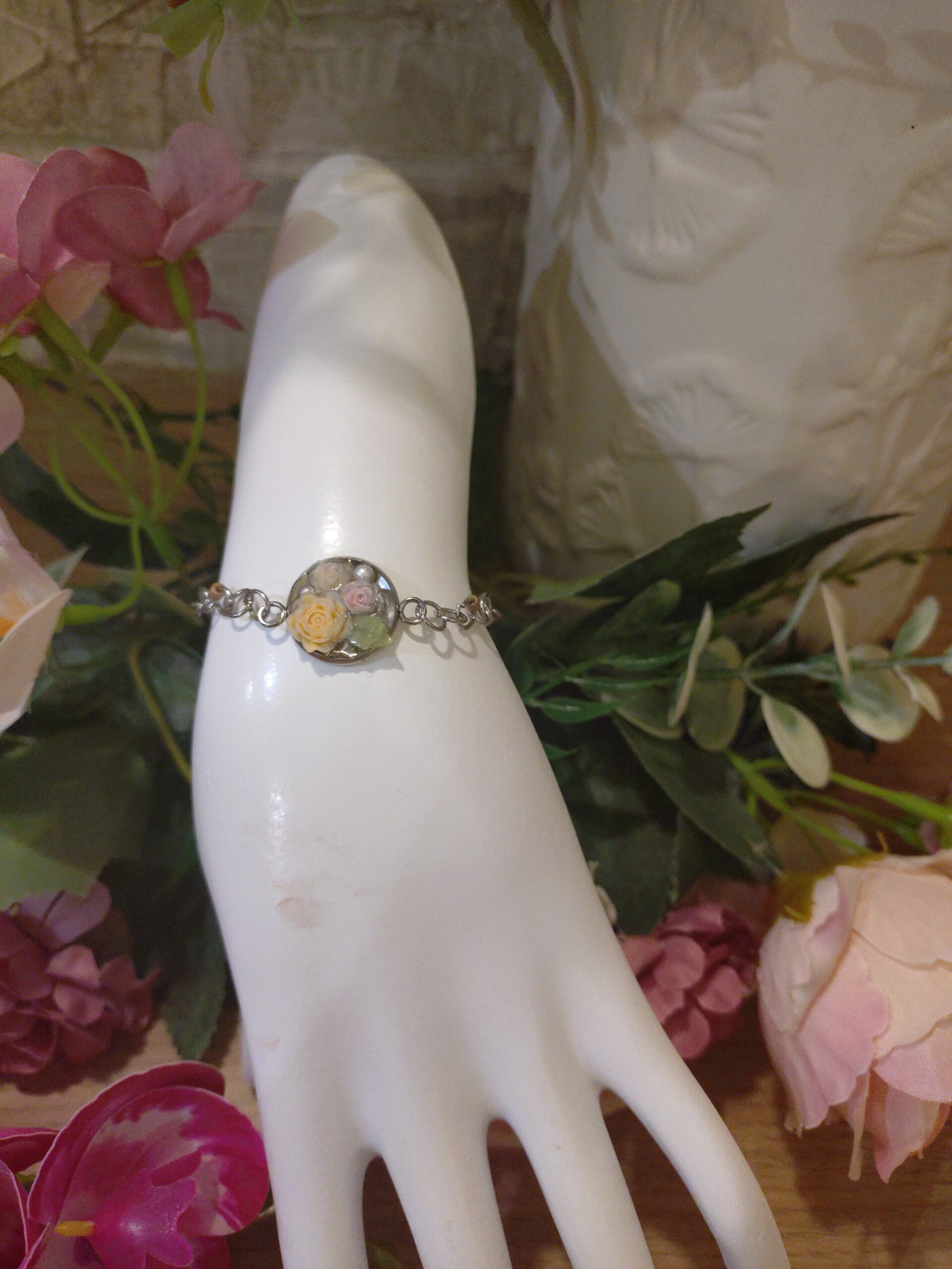 Bracelet noir argent et pêche