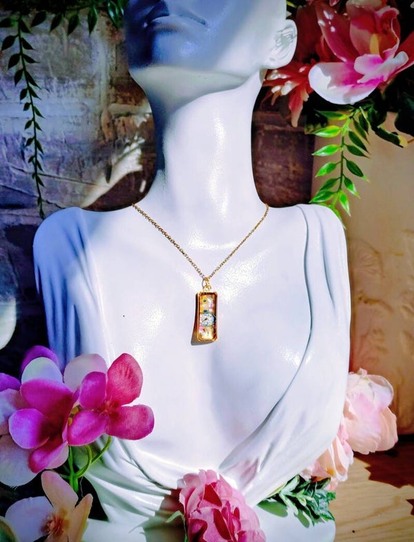Collier médaillon horloge