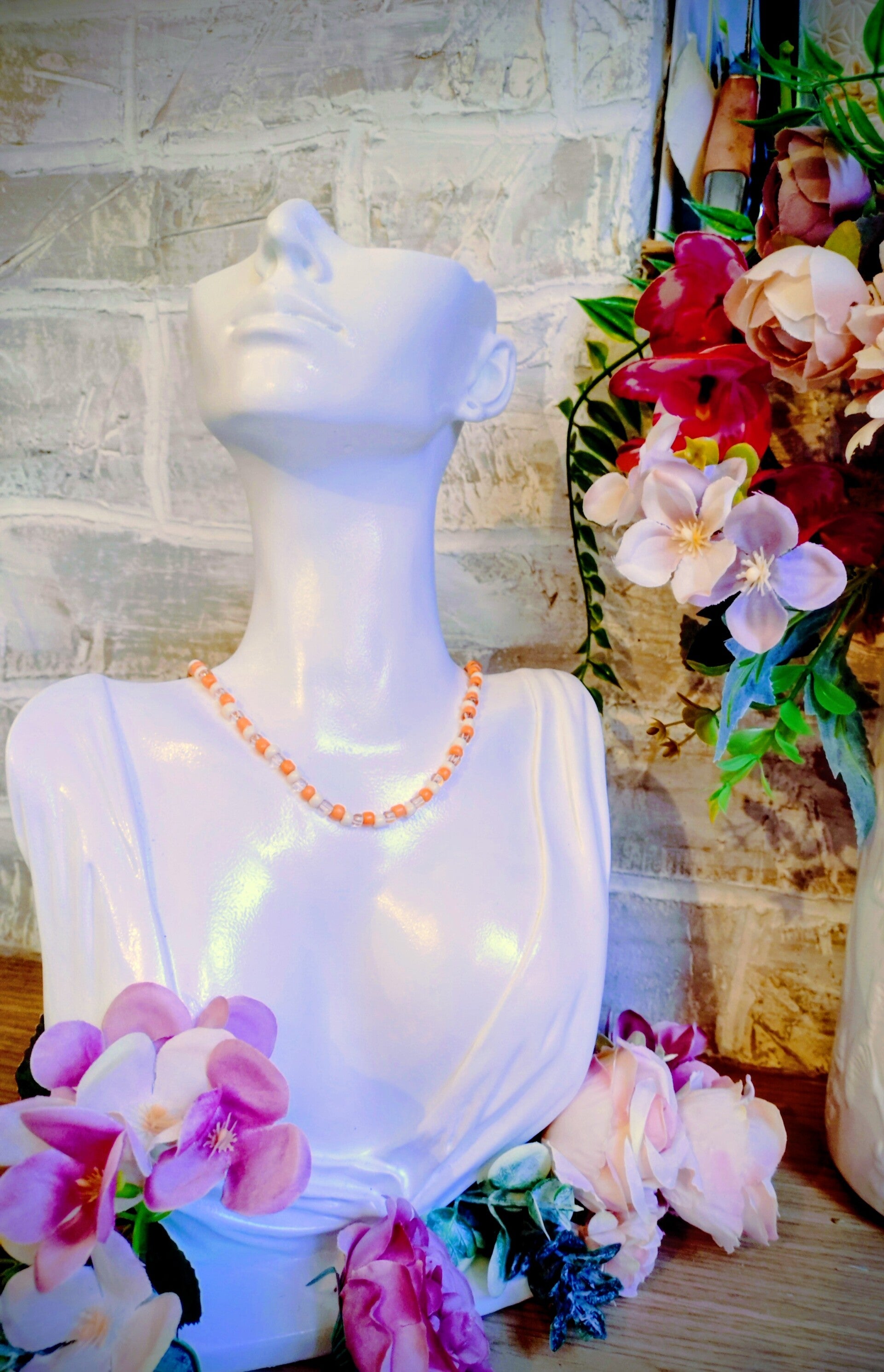 Collier perles orange et blanc